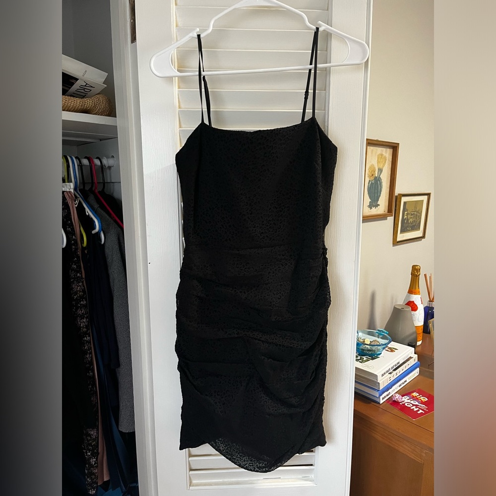 Small black mini dress. The East Order